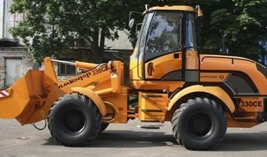 фото Погрузчик универсальный АМКОДОР 330СЕ