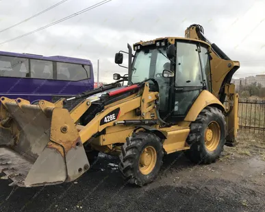 фото Аренда экскаватора-погрузчика Caterpillar 428E, Санкт-Петербург