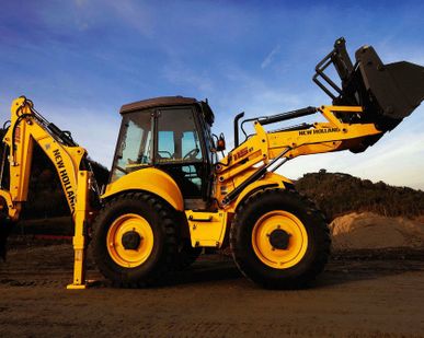 фото Экскаватор-погрузчик New Holland B115B