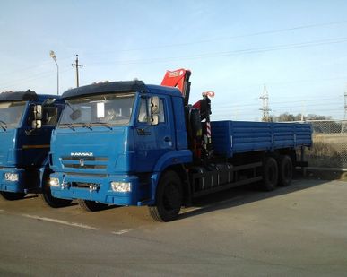 фото КамАЗ 65117 c КМУ FASSI F215A 0.22