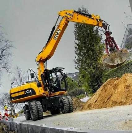 Фото №0 Колесный экскаватор с грейфером