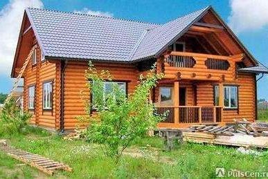 фото Дома из оцилиндрованного бревна