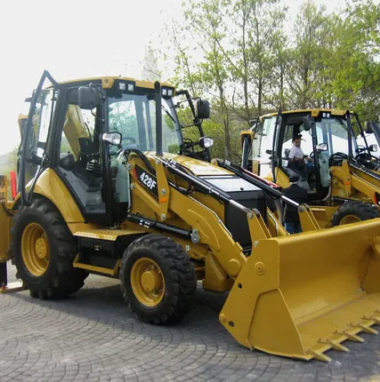 Фото №0 Экскаватор погрузчик CAT