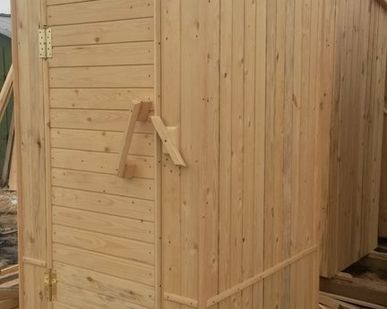 фото Туалет деревянный для сада