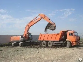 фото Вывоз разработанного грунта на полигон автотранспортом