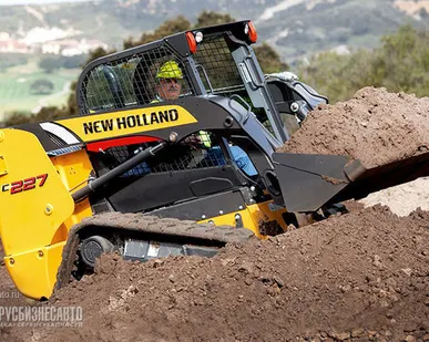 фото Мини-погрузчик гусеничный New Holland С227