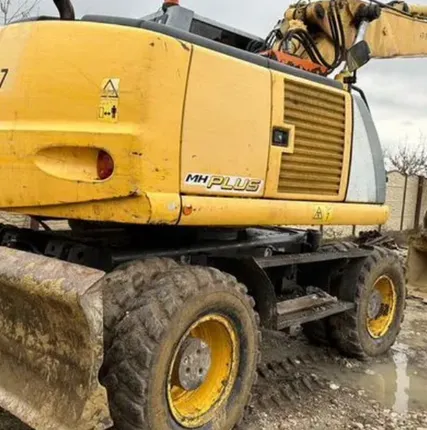 Фото №0 Колёсный экскаватор New Holland MH Plus