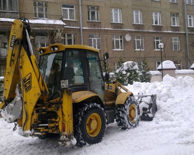 фото Трактор для уборки снега