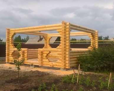 фото Беседка из оцилиндрованного бревна