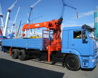 фото Аренда крана-манипулятора борт 12тонн, стрела 7тонны