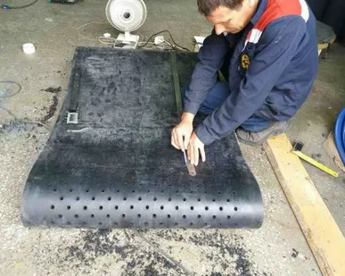 фото Лента конвейерная с отверстиями