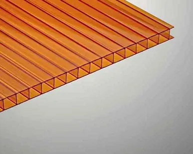 фото Поликарбонат 2100х6000х8мм (оранжевый) Unippol 0,9кг/м2 пленка с 1 стороны