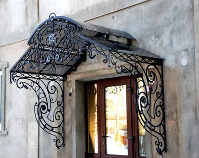 фото Кованые козырьки