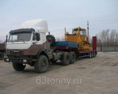 фото Перевозка бульдозера на трале