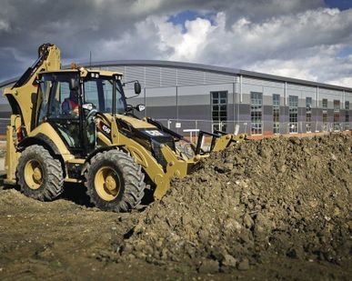 фото Аренда экскаватора-погрузчика TEREX