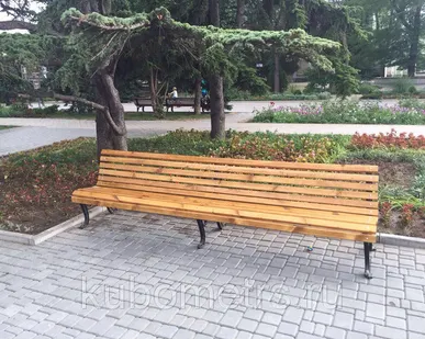 фото Скамейки из дерева чугунные "Волна"