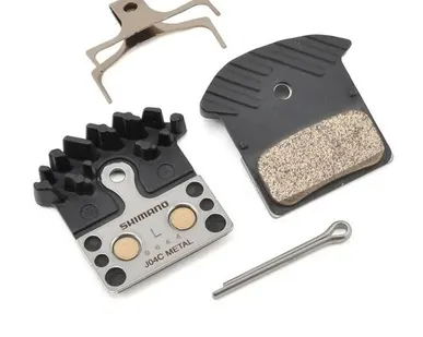 фото Тормоза 0 Тормозные колодки SHIMANO для диск. тор. J04C мет. с радиатором,с пружиной,с шплинтом