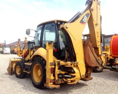 фото CAT 428, 2010 год, Экскаватор-погрузчик