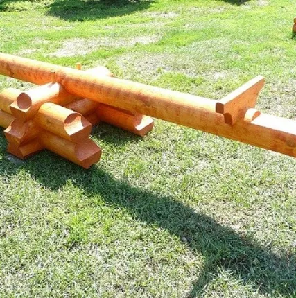 Фото №0 Детские качели из оцилиндрованного бревна