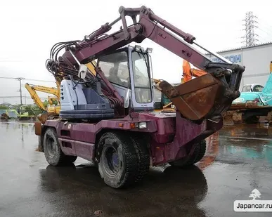 фото Экскаватор Komatsu PW128UU-1