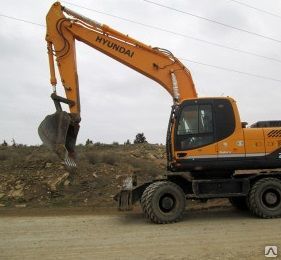 фото Услуги (аренда) экскаватора колесного полноповоротного Hyundai  R 170W