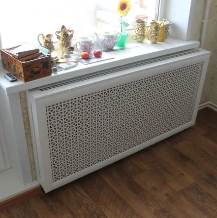 Фото №0 Декоративная решетка на батарею отопления