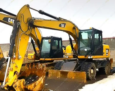 фото Аренда колесного экскаватора Caterpillar M313D, Москва