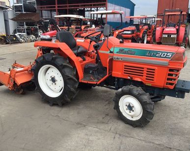 фото Минитрактор японского производства Kubota ZL1-205 с почвофрезой б/у