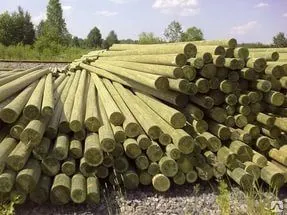 фото Опоры ЛЭП деревянные пропитанные