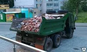 фото Вывоз строительного мусора спецтехникой