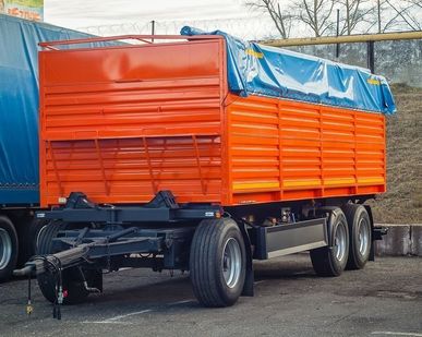 фото Прицеп НЕФАЗ 8560-11-04 24куб.м., боковая разгрузка, полог