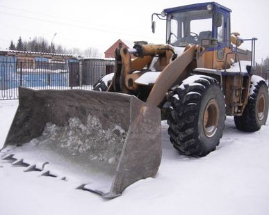 фото Фронтальные погрузчики