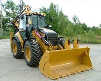 фото Экскаватор погрузчик CAT 444E
