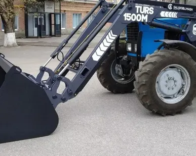 фото Погрузчик фронтальный ТУРС КУН-1500-ОД