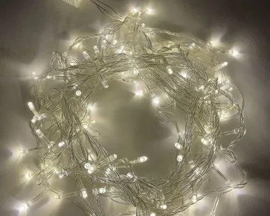 фото Гирлянда светодиодная "Нить" 10м 100LED 8 режимов 220В IP20 тепл. свет ЭРА Б0041894