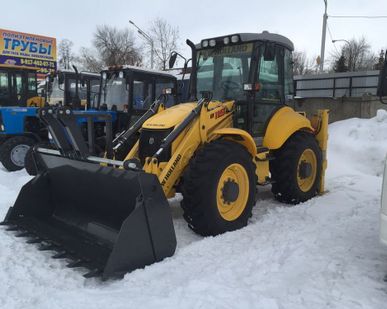 фото Экскаватор-погрузчик New Holland B115B