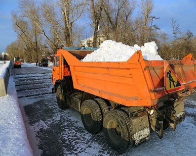 фото Уборка снега грейдером