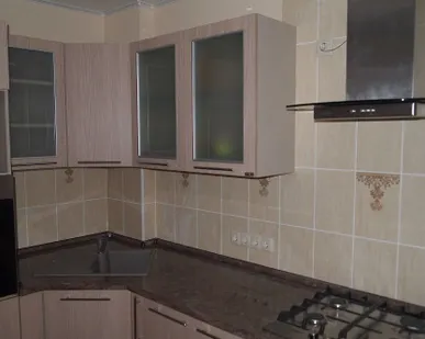 фото Облицовка плиткой  стен на кухне