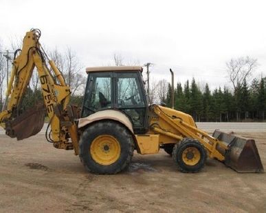 фото Аренда экскаватора-погрузчика New Holland 675E