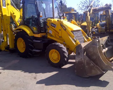фото Аренда Экскаватора погрузчика JCB Ямобур, бара Гидромолот