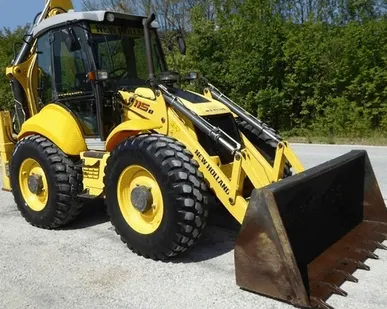 фото Аренда экскаватора погрузчика New Holland B115B