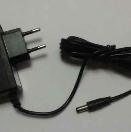 Фото №0 Адаптер (блок питания) 12V, 1A.