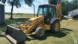 фото Аренда экскаватора-погрузчика New Holland 655E