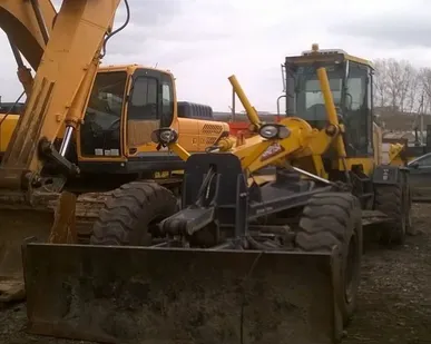 фото Автогрейдер XCMG GR 215 A (2012 г. в.) с наработкой 2000 м/ч.