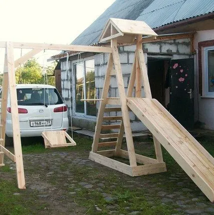 Фото №0 Детская горка с качелями