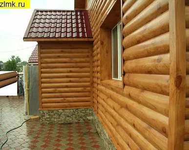 фото Металлический сайдинг  "Бревно"
