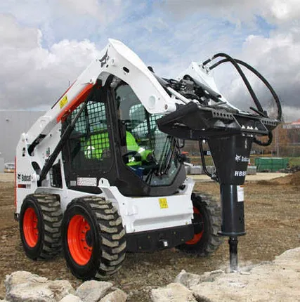 Фото №0 Мини погрузчик с гидромолотом в аренду.