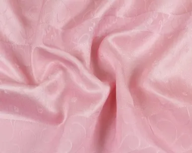 фото Жаккард розовый Италия Состав: шёлк 75 %, вискоза 25 % Плотность ≈70 г/м² Ширина 146 см