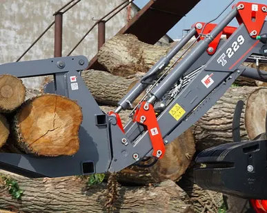 фото Захват для бревен усиленный навесной на фронтальные погрузчики Metal-Fach