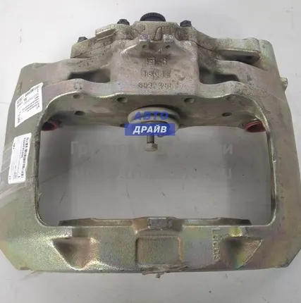 Фото №0 Оригинальный суппорт Рено передний левый (без скобы)